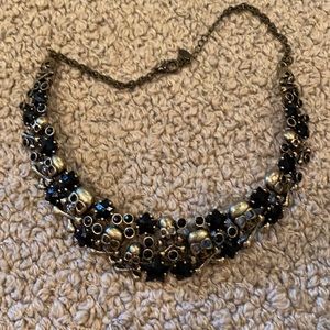 Black stone with skulls necklace